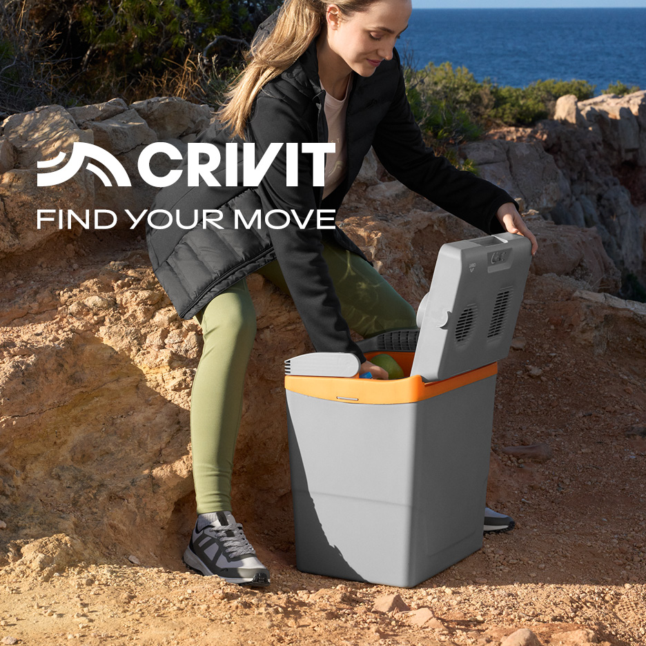 Woman opening a portable cooler on a rocky trail, with text 'FIND YOUR MOVE'.