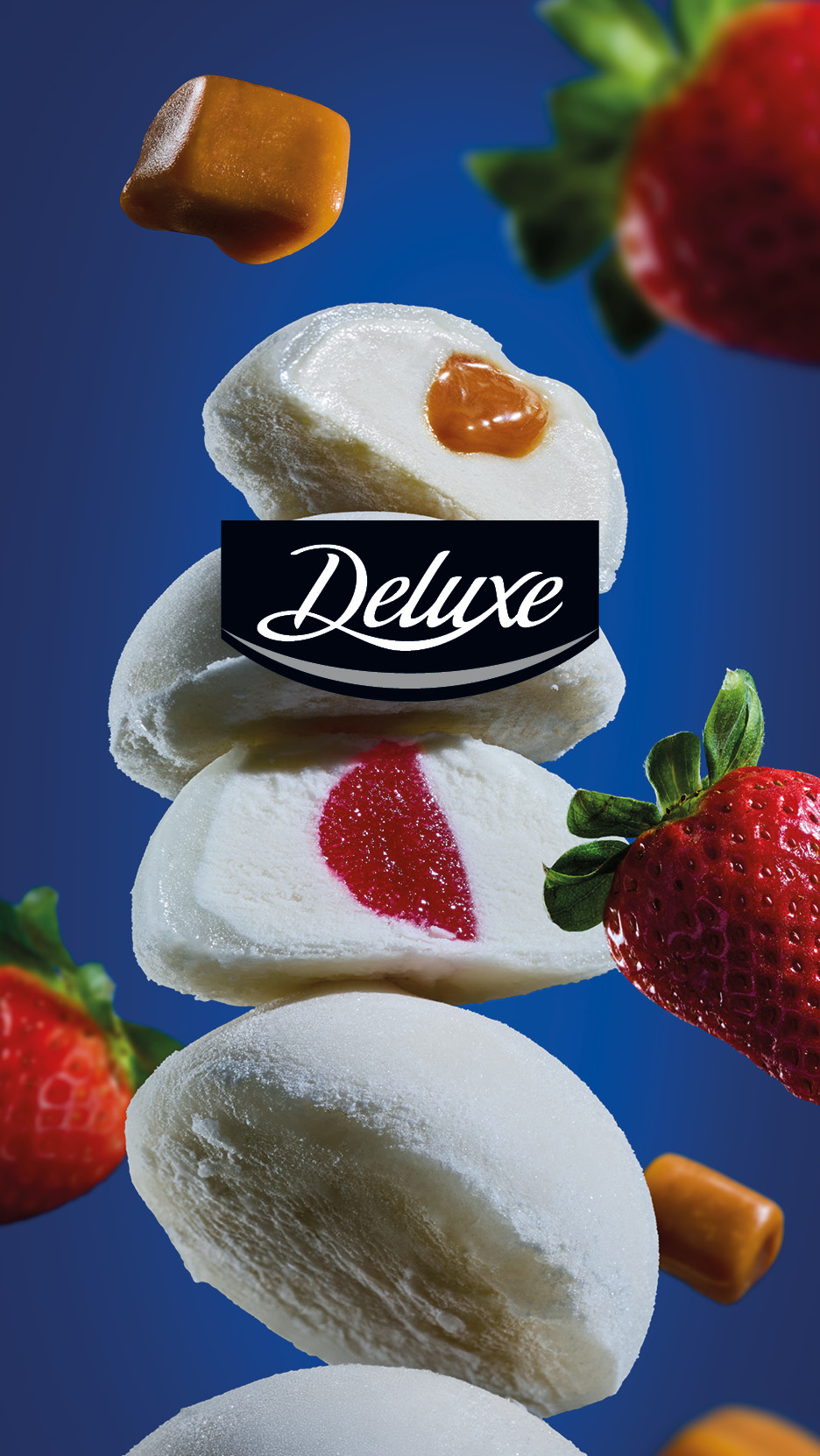 Stacked mochi ice cream with caramel and strawberry fillings, surrounded by strawberries and caramels, with a 'Deluxe' logo.